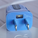 A tiny window protecting an LED is the only hint that this plug does more than meets the eye.